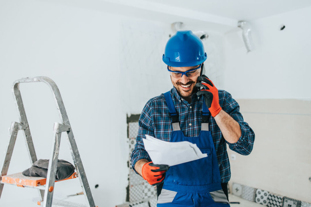 A Magnum Renovations team member discusses plans