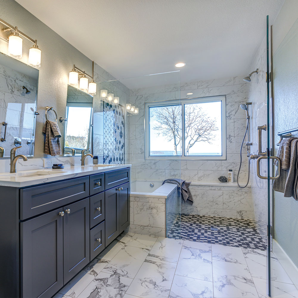 newly renovated bathroom featuring beautiful marble floors and tiles