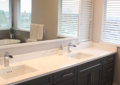 Gorgeous renovated bathroom with new tile, double vanity,