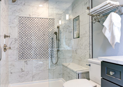 Bathroom Renovations Vancouver, gorgeous renovated bathroom with new tile, double vanity, and walk-in shower
