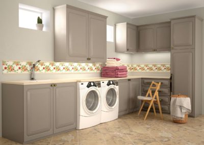 Functional and stylish renovated laundry room with plenty of storage and counter space. The grey color scheme and modern finishes give the room a fresh and contemporary feel. Features include a new washing machine and dryer, as well as a sink and folding area