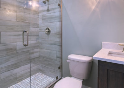 classic design of small condo bathroom with ceramic tiles