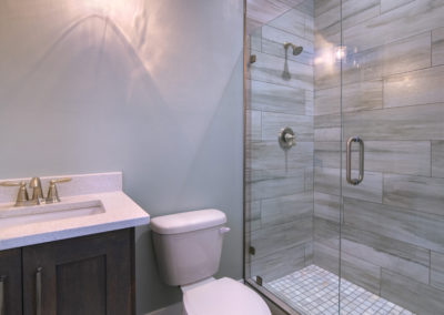 classic design of small condo bathroom with ceramic tiles